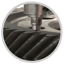 Rockwell C Hardness Test being conducted on a steel component